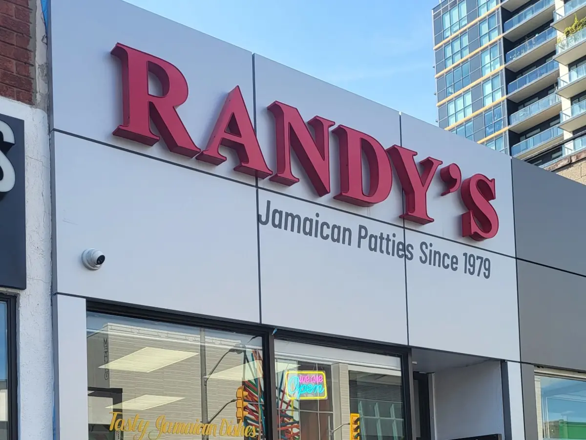 The Randy's storefront on Eglinton Avenue West with its red RANDY'S sign above the windows